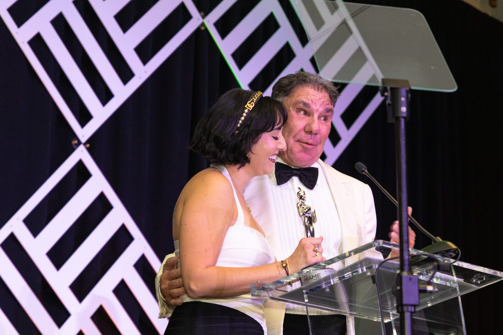 carlaferreira_the-aurora-highlands-father-daughter-developers-carla-and-carlo-ferreira-accept-mame-for-community-of-the-year-2024